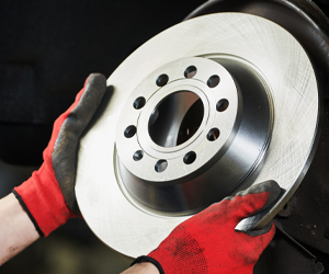 Up close to Brake Disk being replaced on vehicle | South Denver Automotive
